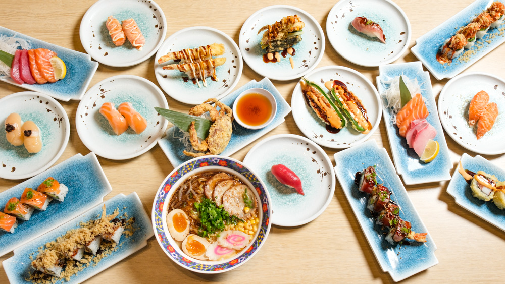 Sushi train conveyor belt with various sushi dishes